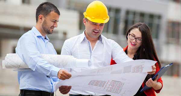 civil engineers looking at construction plan